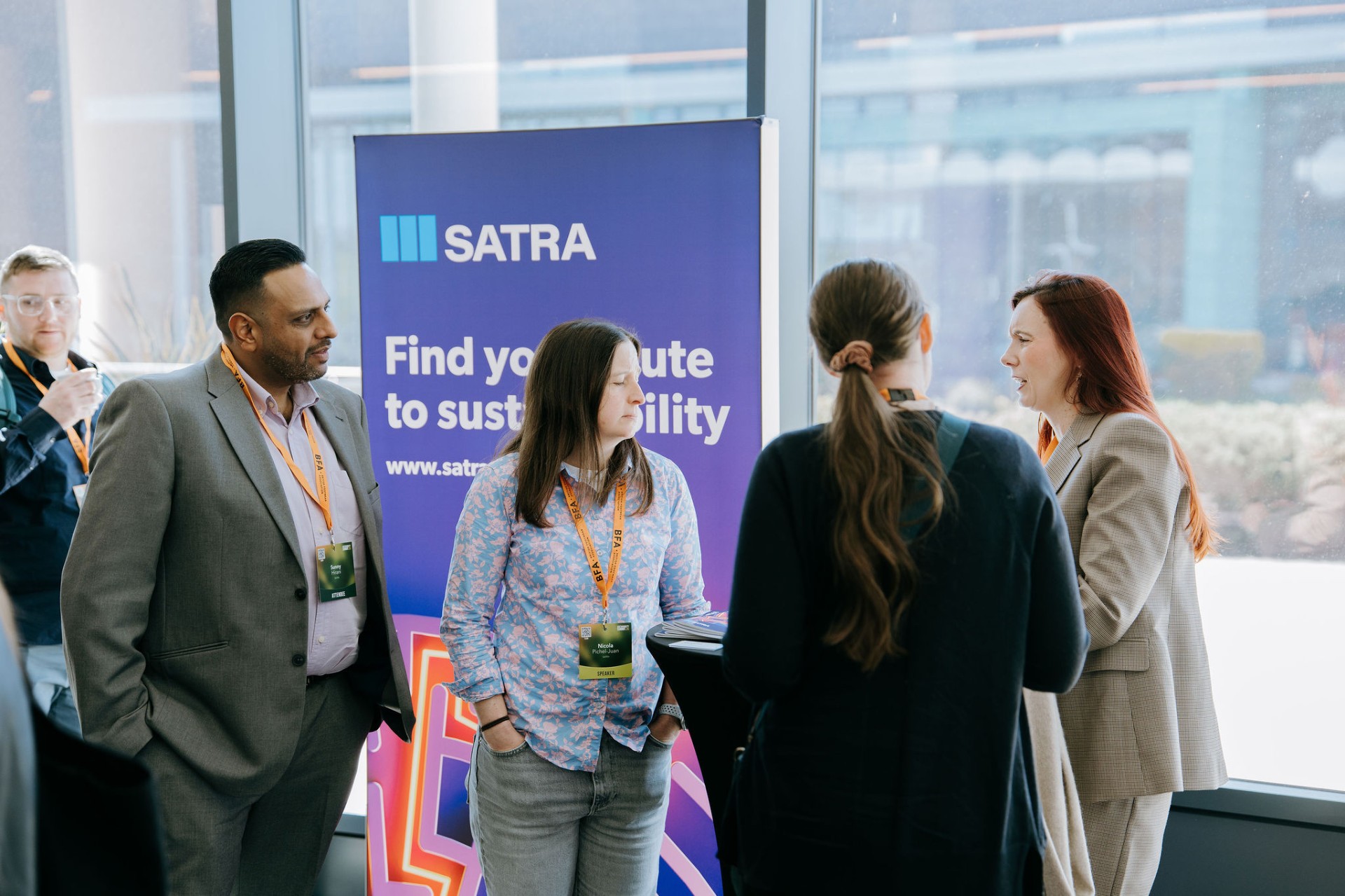 Sponsor expo stand with delegates networking