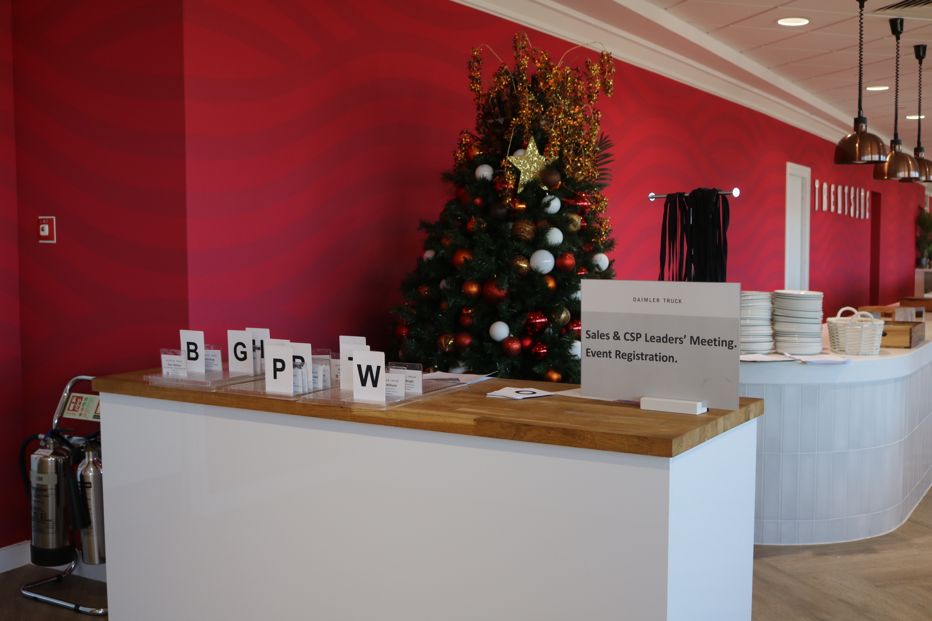 Branded event registration desk on arrival